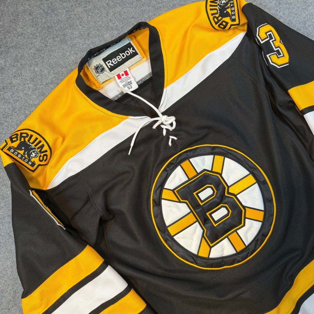 Reebok Boston Bruins Brad Marchand 63 NHL Hockey Jersey Black Gold Mens 52